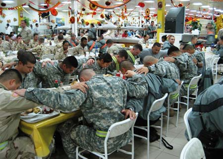 American soldiers praying before a Thanksgiving meal. Let us keep them ...