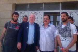 Senator John McCain with bearded jihadists. McCain entered Syria illegally to show support for the these terrorists.