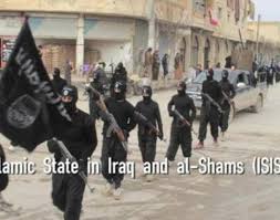Islamic terrorists marching victoriously through a city in Iraq.
